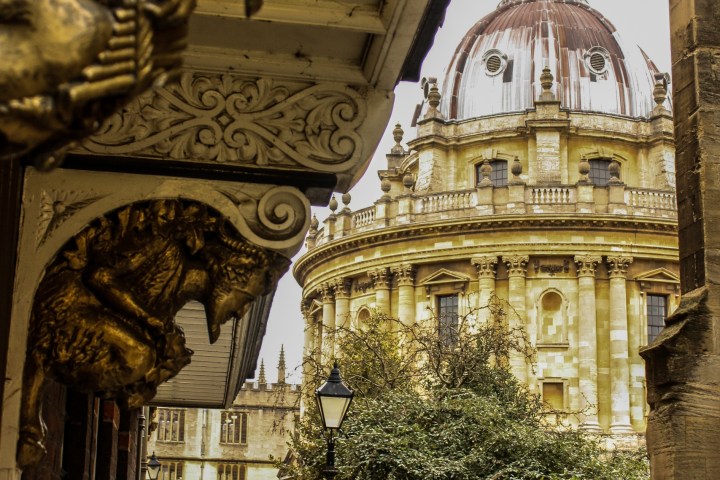 a statue in front of a building