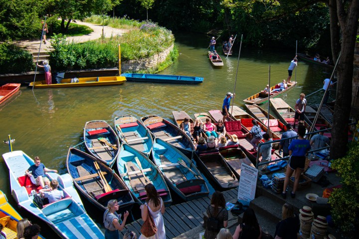 a group of people on punts