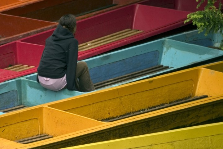 a person sitting on a punt