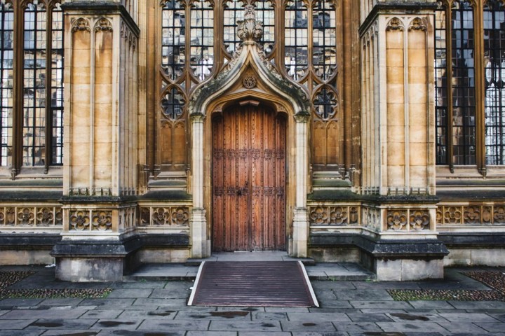 a stone building with a wooden door